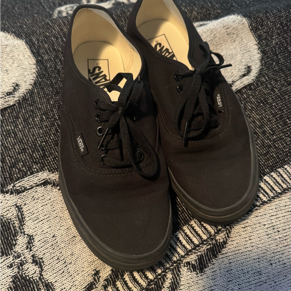 Vans woman’s Black Canvas Lace-Up Sneakers